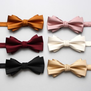 Solid-color men's polyester bow ties in stock, including multi-colored wedding groom and groomsmen bow ties and tie ties.